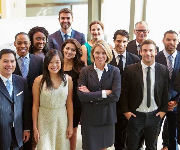 Multi-cultural Office Staff Standing in Lobby