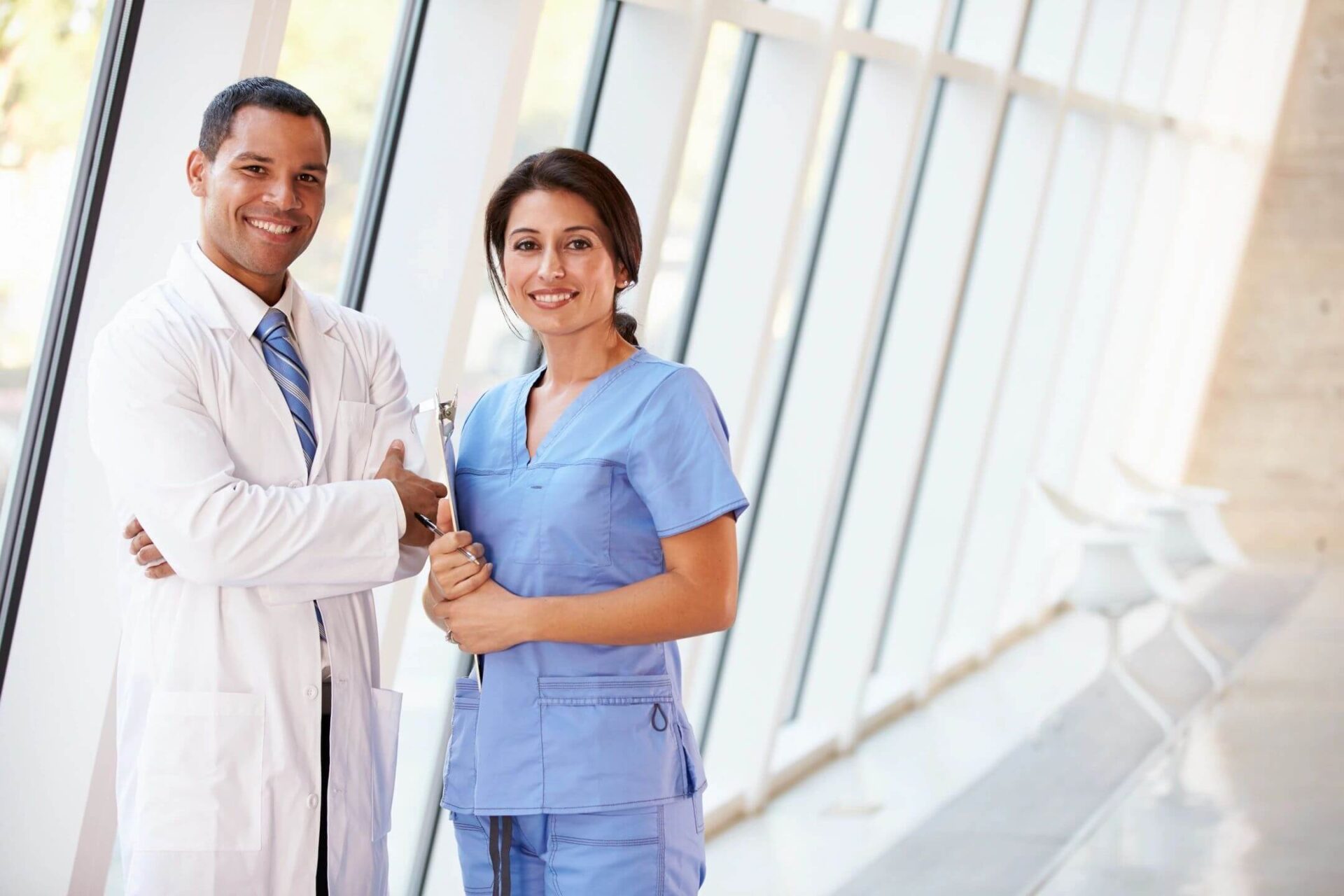 Portrait of Medical Staff in Corridor Inside Modern Hospital