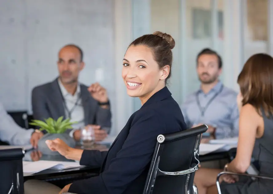 Young Businesswoman Attending Meeting