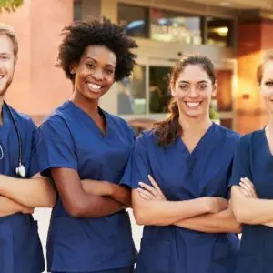 Portrait of Medical Team Standing Outside Hospital